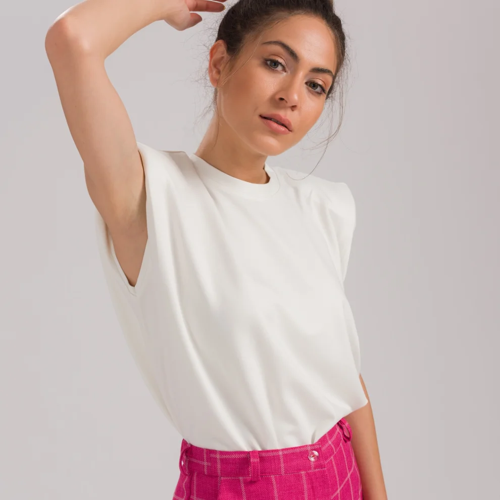 White shoulder pad online t shirt