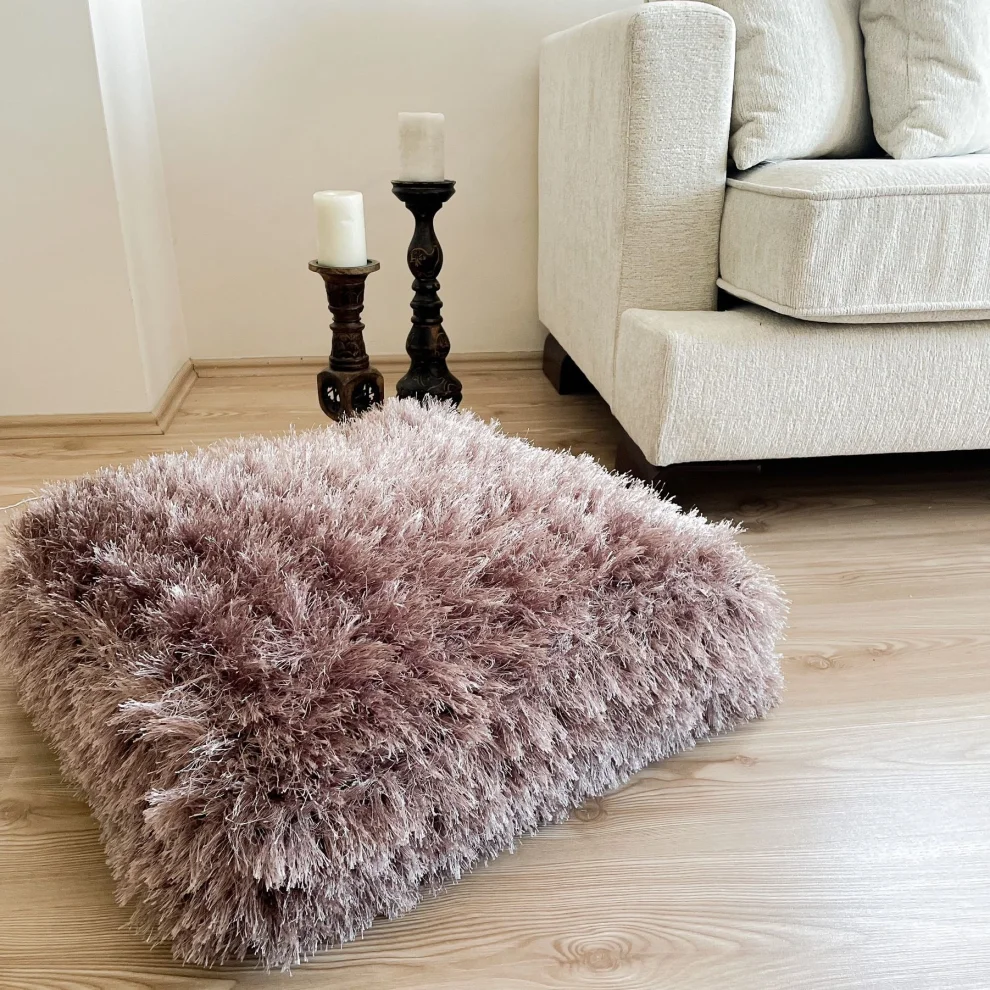 Floor cushion outlet pouffe