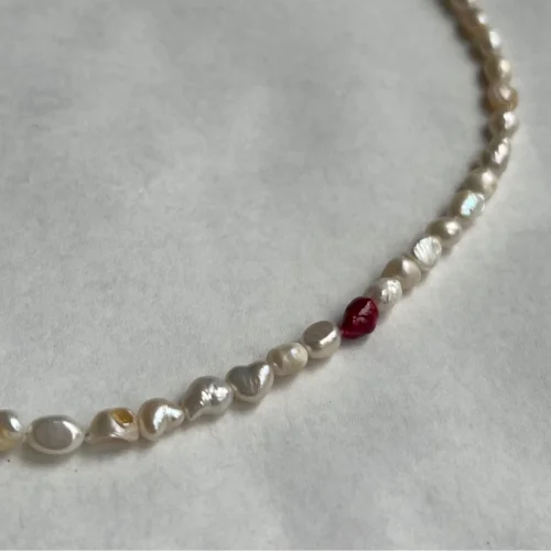Lit Clue - Pearl Necklace