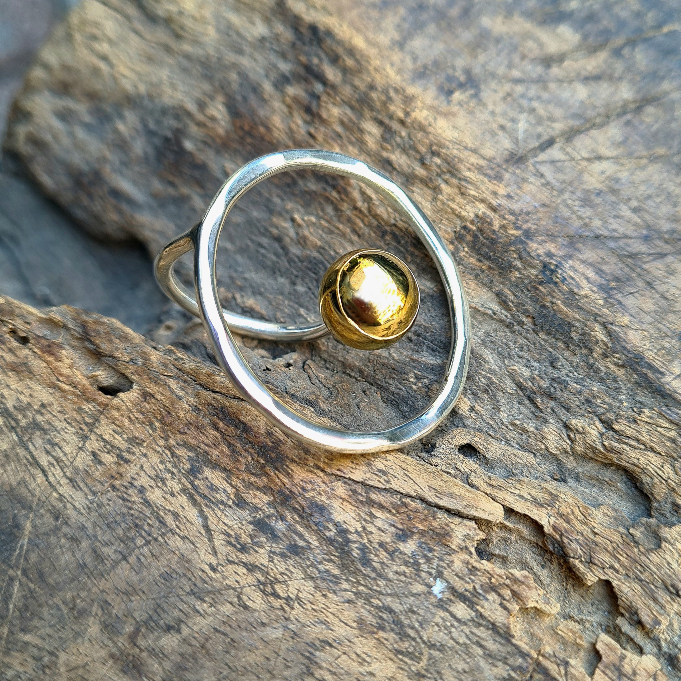 Geometric Silver Circle Ring With A Golden Ball