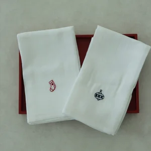 Embroidered Muslin Napkin With Sock And Decorative Stitching