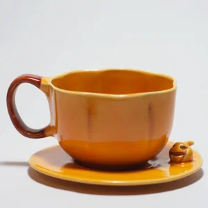 Stoneware Pumpkin Cup And Saucer